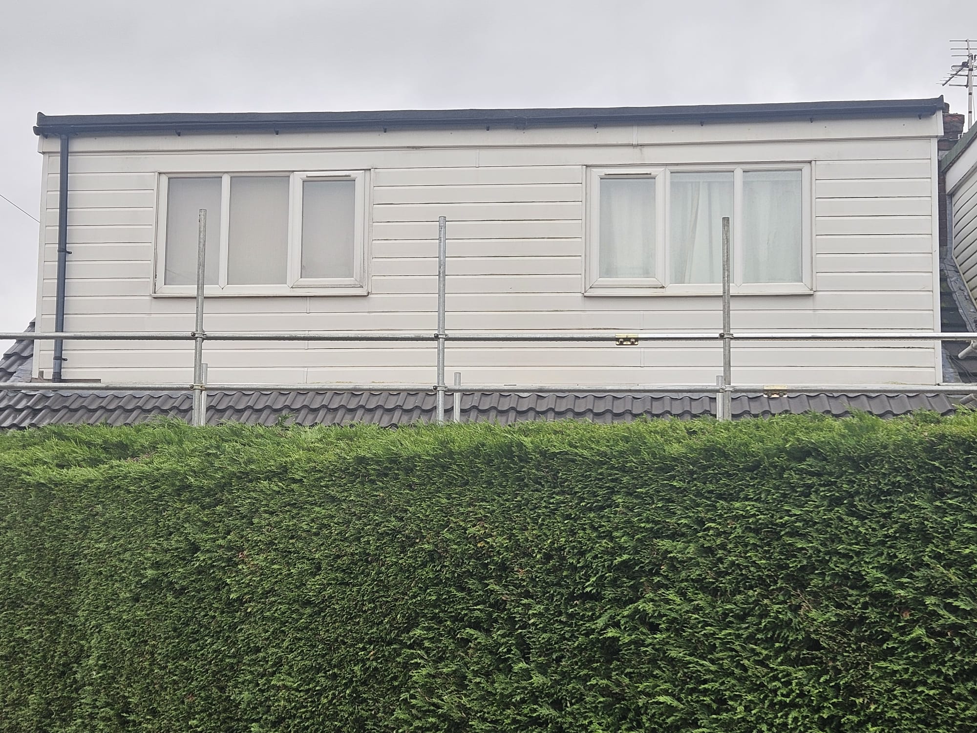 Existing Cream Cladding — Before