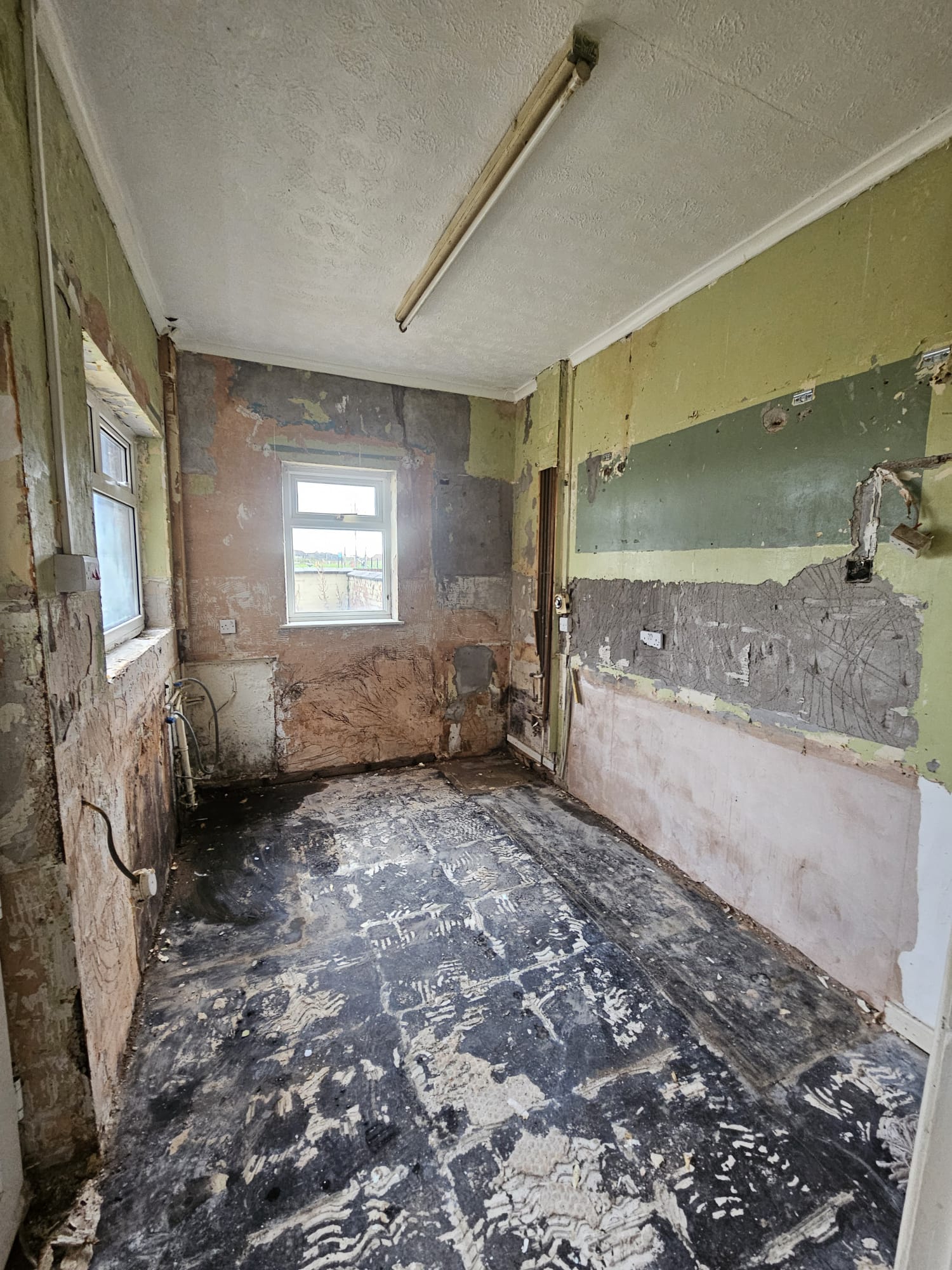 Walls Back to Brick — Ready for Replaster